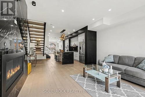 826 Alpine Avenue, Ottawa, ON - Indoor Photo Showing Living Room With Fireplace