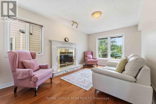 86 Sai Crescent, Ottawa, ON - Indoor Photo Showing Living Room With Fireplace