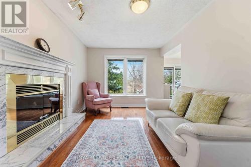86 Sai Crescent, Ottawa, ON - Indoor Photo Showing Living Room With Fireplace