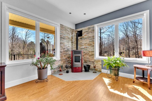 Salon - 35 Rue Des Érables, Saint-Sixte, QC -  Photo Showing Other Room With Fireplace