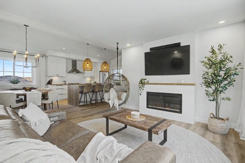 Salon - 2582 Ch. Bellerive, Carignan, QC - Indoor Photo Showing Living Room With Fireplace