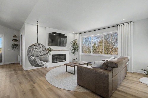 Salon - 2582 Ch. Bellerive, Carignan, QC - Indoor Photo Showing Living Room With Fireplace