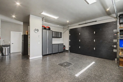 Garage - 2582 Ch. Bellerive, Carignan, QC - Indoor Photo Showing Garage