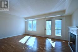 Living Area with French Doors to Covered Deck - 