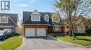 Brick-faced exterior with white trim accents and dark shingle roof - 79 Holbrook Crescent, Cambridge, ON  - Outdoor With Facade 