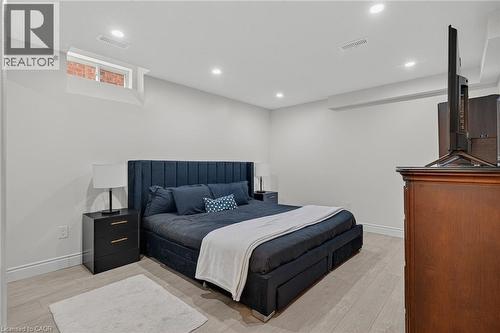 Bedroom featuring light wood-finish flooring and recessed ceiling lighting - 79 Holbrook Crescent, Cambridge, ON - Indoor Photo Showing Bedroom