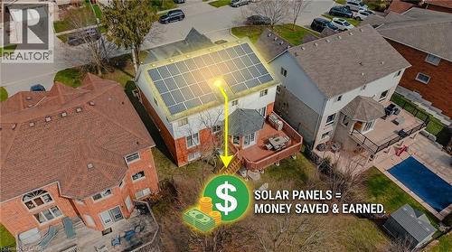 Two-story residence featuring a full array of rooftop solar panels - 79 Holbrook Crescent, Cambridge, ON - 