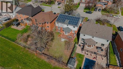 Aerial perspective showcasing three distinct properties, each featuring a rear deck or patio area - 79 Holbrook Crescent, Cambridge, ON - Outdoor