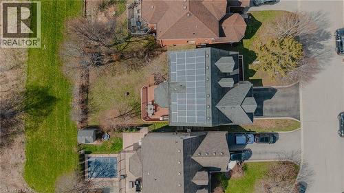 Residential property with a gabled roofline featuring solar panels - 79 Holbrook Crescent, Cambridge, ON - Outdoor
