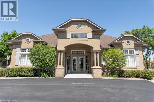 1800 Walkers Line Unit# 302, Burlington, ON - Outdoor With Facade