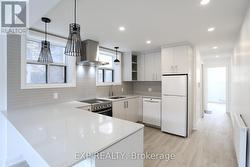 1 - 73 BALFOUR AVENUE Toronto, ON M4C 1T4