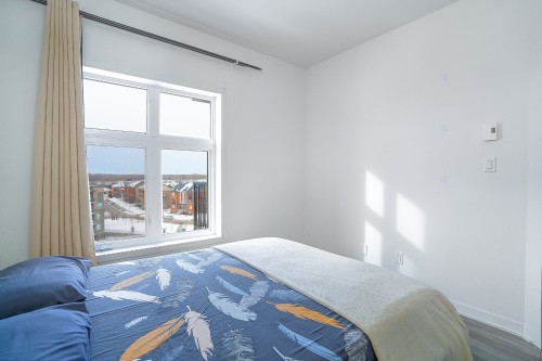 Chambre à coucher - 605-9185 Rue Lennon, Brossard, QC - Indoor Photo Showing Bedroom