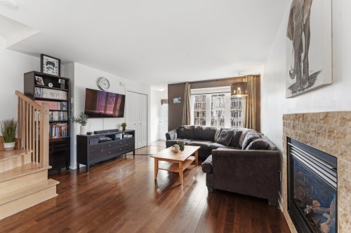 Salon - 677 Rue De Pompadour, Mascouche, QC - Indoor Photo Showing Living Room With Fireplace