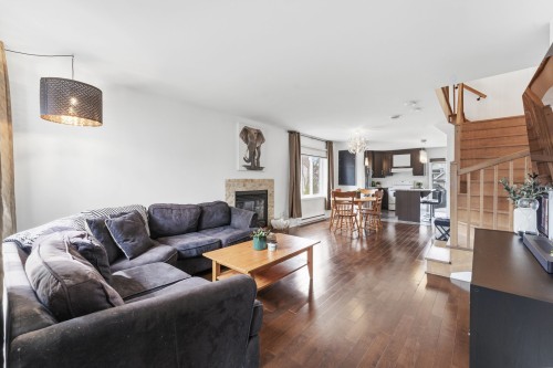 Salon - 677 Rue De Pompadour, Mascouche, QC - Indoor Photo Showing Living Room With Fireplace