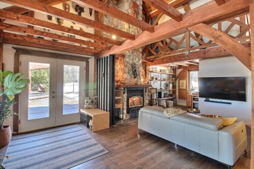 Vue d'ensemble - 51 Rue Du Lac, Saint-Marc-De-Figuery, QC - Indoor Photo Showing Living Room With Fireplace