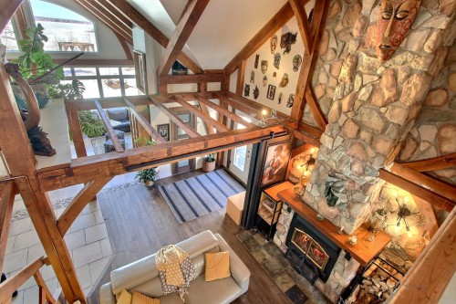 Vue - 51 Rue Du Lac, Saint-Marc-De-Figuery, QC - Indoor Photo Showing Other Room With Fireplace