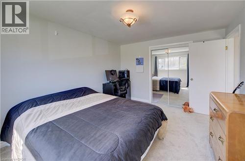Bedroom featuring light-colored carpeting and a ceiling-mounted light fixture - 172 Rennie Drive, Kitchener, ON - Indoor Photo Showing Bedroom