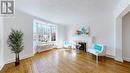 19 Strathgowan Crescent, Toronto, ON  - Indoor Photo Showing Living Room With Fireplace 