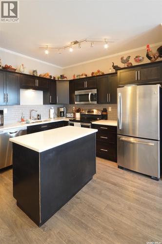 321 545 Hassard Close, Saskatoon, SK - Indoor Photo Showing Kitchen With Upgraded Kitchen