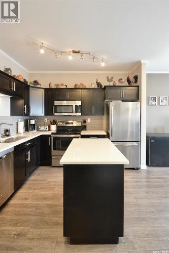 321 545 Hassard Close, Saskatoon, SK - Indoor Photo Showing Kitchen With Upgraded Kitchen