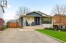 Single-story home featuring a contemporary exterior with light brick and dark siding accents - 30 Darlington Drive, Hamilton, ON  - Outdoor With Deck Patio Veranda 