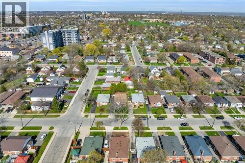 Aerial perspective showcasing a residential neighborhood with a mix of single-family homes and multi-story apartment buildings - 406 East 43Rd Street, Hamilton, ON - Outdoor With View