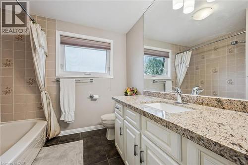 Bathroom featuring an expansive vanity with a light-toned countertop and an integrated sink - 42 Trailview Drive, Kitchener, ON - Indoor Photo Showing Bathroom