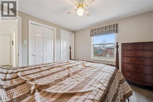 Bedroom featuring light neutral wall paint and wood-finish flooring - 42 Trailview Drive, Kitchener, ON - Indoor Photo Showing Bedroom