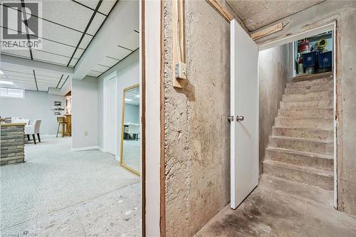 Lower level featuring drop ceiling, recessed lighting, and mixed flooring with carpet and tile - 42 Trailview Drive, Kitchener, ON - Indoor Photo Showing Other Room
