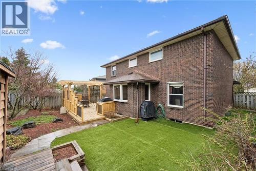 Multi-level wood deck with a built-in privacy screen and pergola - 42 Trailview Drive, Kitchener, ON - Outdoor With Exterior