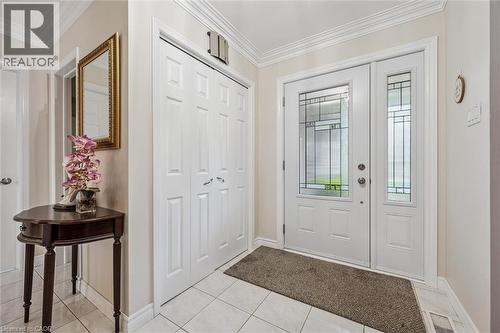 Entryway featuring a white front door with decorative glass inserts and a coordinating sidelight - 42 Trailview Drive, Kitchener, ON - Indoor Photo Showing Other Room