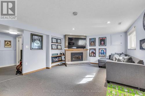 24 Shuh Avenue, Kitchener, ON - Indoor Photo Showing Living Room With Fireplace