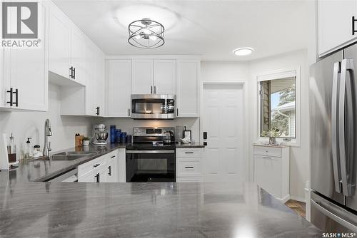 12 80 Berini Drive, Saskatoon, SK - Indoor Photo Showing Kitchen With Double Sink With Upgraded Kitchen