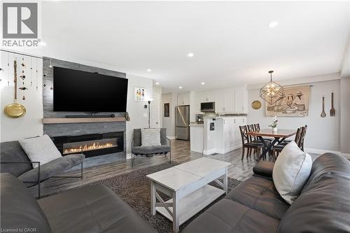 3 Rembe Avenue, Hamilton, ON - Indoor Photo Showing Living Room With Fireplace