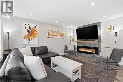 3 Rembe Avenue, Hamilton, ON - Indoor Photo Showing Living Room With Fireplace