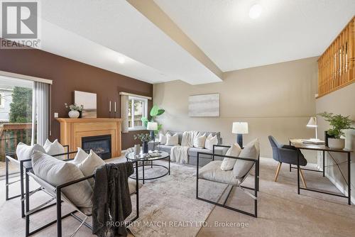 Family Room with gas fireplac - 680 Ormond Drive, Oshawa, ON - Indoor Photo Showing Living Room With Fireplace