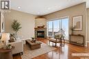607 Beckett Crescent, Saskatoon, SK  - Indoor Photo Showing Living Room With Fireplace 