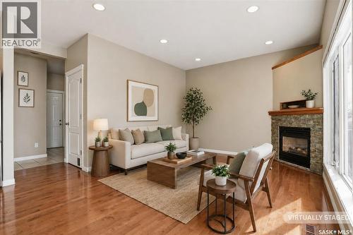 607 Beckett Crescent, Saskatoon, SK - Indoor Photo Showing Living Room With Fireplace