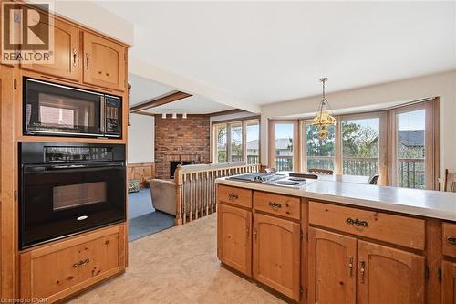 2018 Barlow Crescent, Burlington, ON - Indoor Photo Showing Kitchen With Fireplace