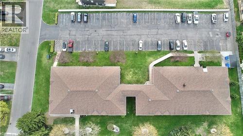 Parking lot - exclusive number parking spaces and visitor parking - 60 Donly Drive S Unit# 101, Simcoe, ON - 