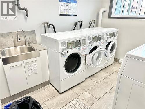 Couple doors down the hall is the Laundry Room - 60 Donly Drive S Unit# 101, Simcoe, ON - Indoor Photo Showing Laundry Room