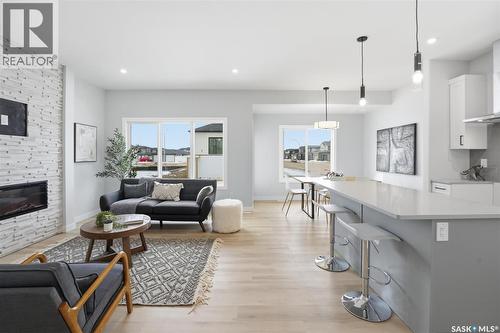 410 Leskiw Bend, Saskatoon, SK - Indoor Photo Showing Living Room With Fireplace