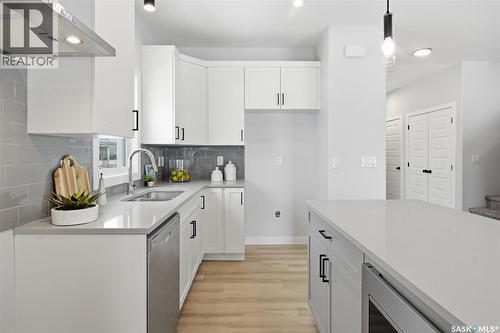 410 Leskiw Bend, Saskatoon, SK - Indoor Photo Showing Kitchen With Double Sink