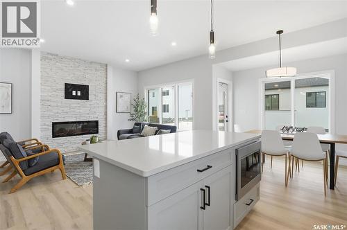 410 Leskiw Bend, Saskatoon, SK - Indoor With Fireplace