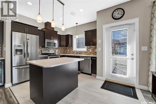 102 Atton Crescent, Saskatoon, SK - Indoor Photo Showing Kitchen With Stainless Steel Kitchen With Upgraded Kitchen