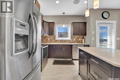 102 Atton Crescent, Saskatoon, SK - Indoor Photo Showing Kitchen With Stainless Steel Kitchen With Upgraded Kitchen
