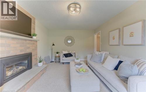 159 Burnett Avenue, Cambridge, ON - Indoor Photo Showing Living Room With Fireplace