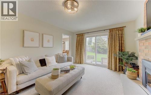 159 Burnett Avenue, Cambridge, ON - Indoor Photo Showing Living Room With Fireplace