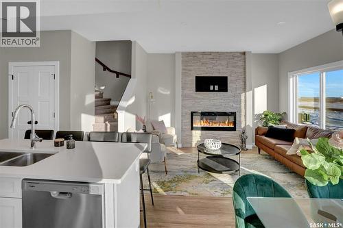 414 Leskiw Bend, Saskatoon, SK - Indoor Photo Showing Other Room With Fireplace