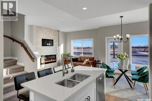 414 Leskiw Bend, Saskatoon, SK - Indoor Photo Showing Other Room With Fireplace